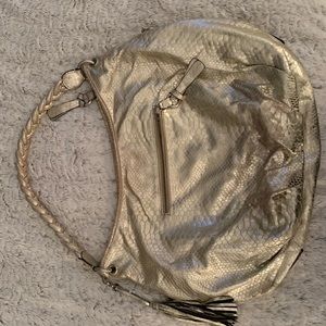 In very good shape, handle is a little worn but blends in with the color